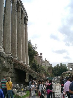 The view up the Via Sacra showing the Temple of Antinous Pius and Faustina and the Temple of Romulus.